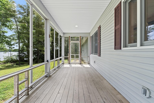 73 Hodsdon Ln, Jefferson, ME 04348 - unfurnished sunroom with healthy amount of natural light and a water view