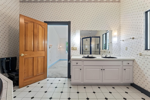 73 Hodsdon Ln, Jefferson, ME 04348 - bathroom with wallpapered walls, a shower stall, and double vanity