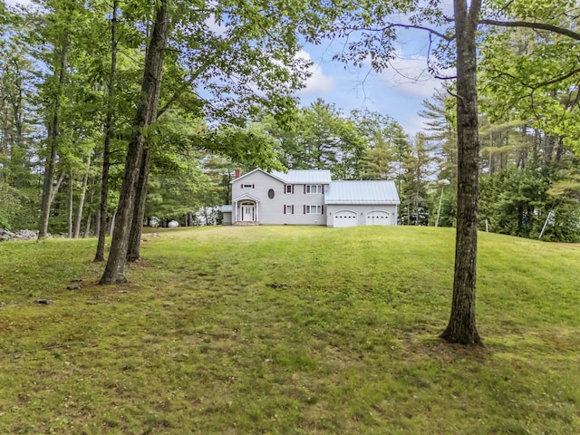 73 Hodsdon Ln, Jefferson, ME 04348 - view of green lawn with a garage