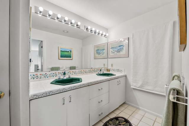 21 Ledge Rd, Cumberland, ME 04110 - full bathroom with double vanity and tile patterned flooring