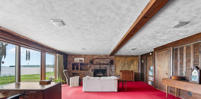 21 Ledge Rd, Cumberland, ME 04110 - carpeted living room with a water view, a brick fireplace, a textured ceiling, wooden walls, and beamed ceiling