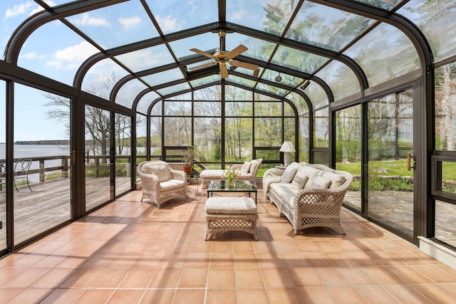 21 Ledge Rd, Cumberland, ME 04110 - sunroom featuring a ceiling fan, an outdoor living space, vaulted ceiling, and a water view