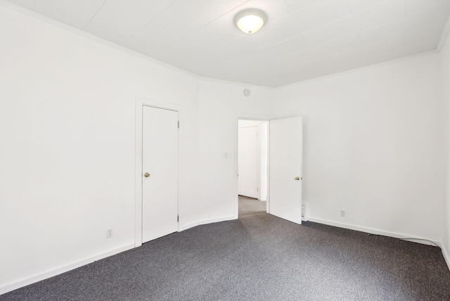 520 Lincoln St, Lewiston, ME 04240 - spare room with dark colored carpet and ornamental molding