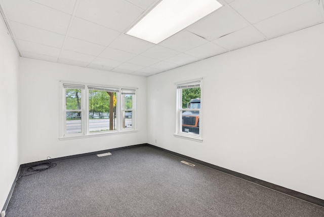 520 Lincoln St, Lewiston, ME 04240 - unfurnished room with a drop ceiling, baseboards, and carpet floors