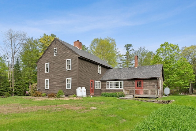 19 Bearce Rd, Winthrop, ME 04364 - rear view of property with a chimney, a lawn, and a shingled roof