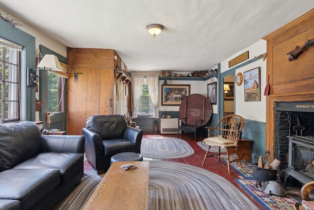 19 Bearce Rd, Winthrop, ME 04364 - living area with a wood stove and wood walls