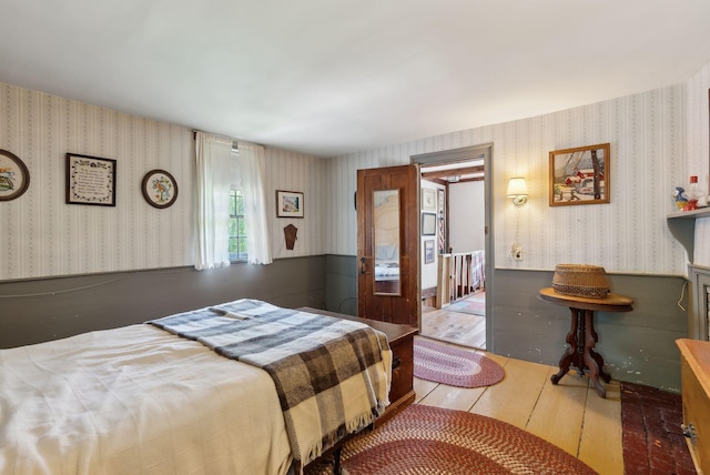 19 Bearce Rd, Winthrop, ME 04364 - bedroom with wallpapered walls and wood finished floors