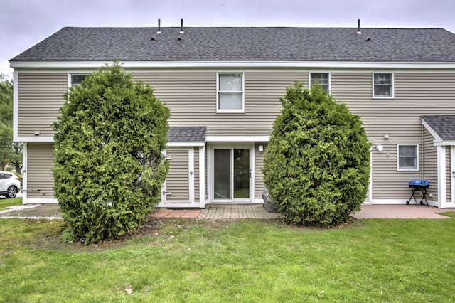 5 Glenridge Dr Unit 5, Portland, ME 04102 - rear view of house featuring a lawn, a patio, and a shingled roof