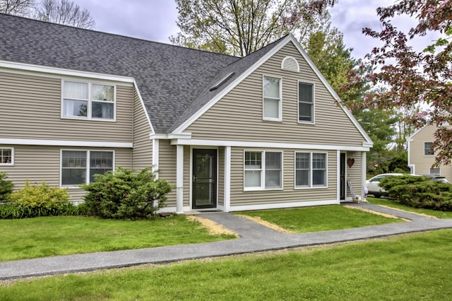 5 Glenridge Dr Unit 5, Portland, ME 04102 - view of front of home with a front lawn and roof with shingles