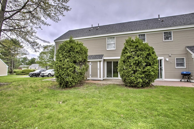 5 Glenridge Dr Unit 5, Portland, ME 04102 - rear view of house featuring a patio area, a yard, and a shingled roof
