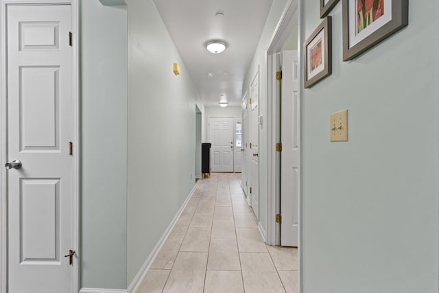 14 Chickadee Cir Unit 14, Brunswick, ME 04011 - hallway with light tile patterned floors and baseboards