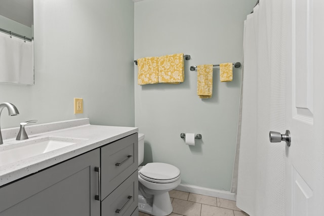 14 Chickadee Cir Unit 14, Brunswick, ME 04011 - bathroom with toilet, vanity, and baseboards