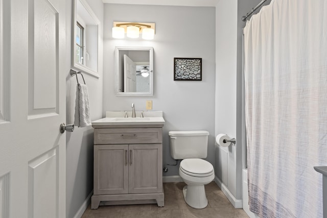 14 Chickadee Cir Unit 14, Brunswick, ME 04011 - full bath with vanity, toilet, baseboards, and tile patterned flooring