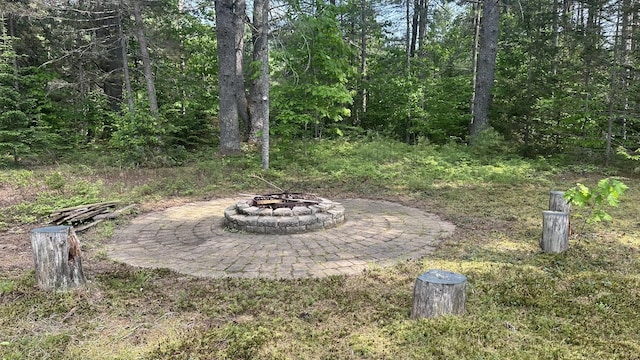 60 Twig Cir, Harrison, ME 04040 - view of yard featuring an outdoor fire pit