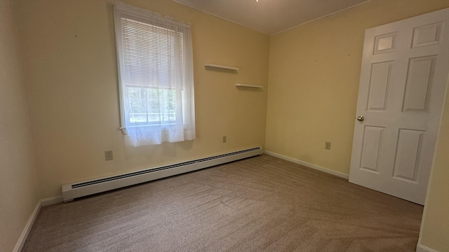 60 Twig Cir, Harrison, ME 04040 - empty room featuring baseboard heating, carpet flooring, and baseboards