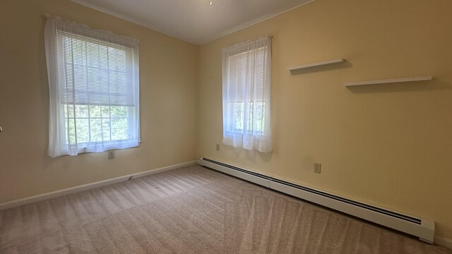 60 Twig Cir, Harrison, ME 04040 - empty room with baseboard heating, baseboards, and carpet flooring