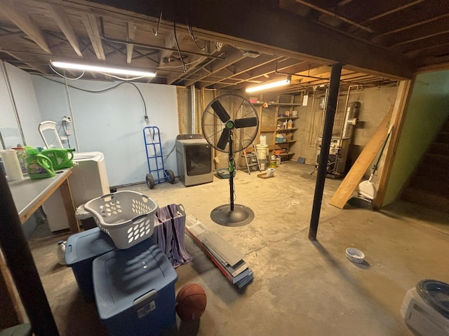 unfinished basement featuring washer / clothes dryer