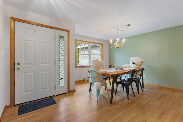 18 Ginger Ln, Saco, ME 04072 - dining room with a chandelier, light wood-type flooring, and baseboards