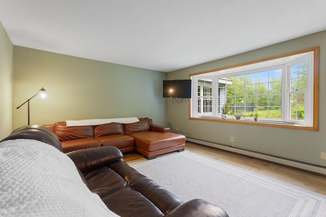 18 Ginger Ln, Saco, ME 04072 - living room featuring wood finished floors and a baseboard heating unit