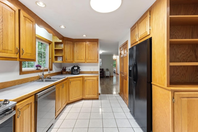 18 Ginger Ln, Saco, ME 04072 - kitchen featuring open shelves, stainless steel appliances, a sink, light tile patterned flooring, and brown cabinetry