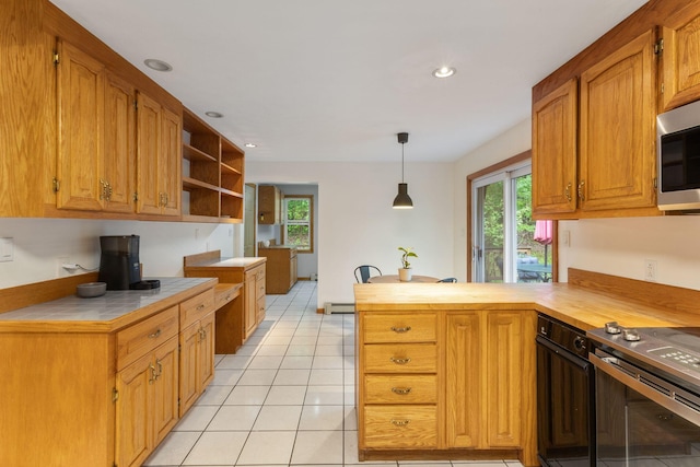 18 Ginger Ln, Saco, ME 04072 - kitchen with healthy amount of natural light, appliances with stainless steel finishes, a peninsula, recessed lighting, and light tile patterned flooring