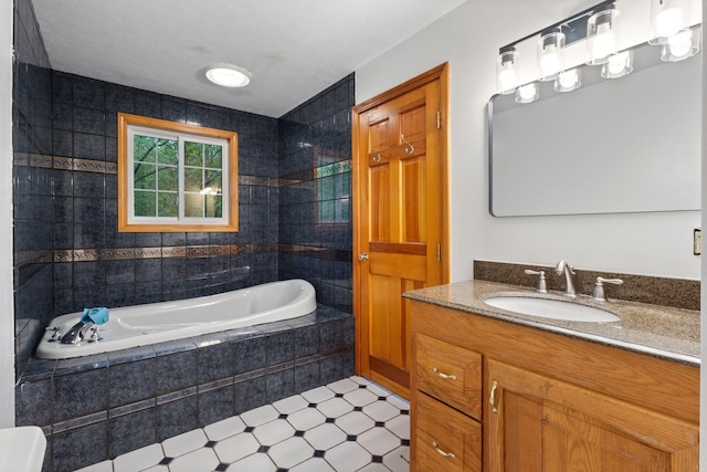 18 Ginger Ln, Saco, ME 04072 - bathroom with a relaxing tiled tub and vanity