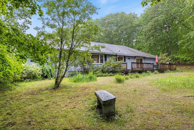 18 Ginger Ln, Saco, ME 04072 - back of property with a wooden deck