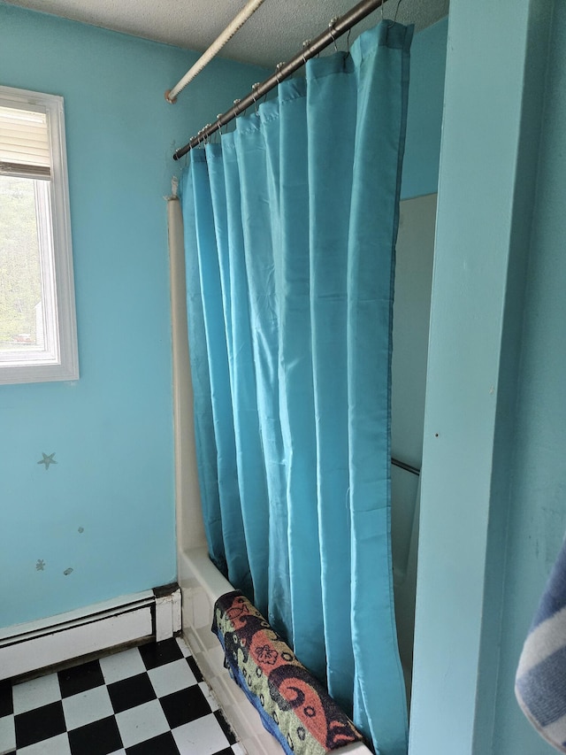 25 Mill Ln, Naples, ME 04055 - full bathroom with tile patterned floors, shower / tub combo with curtain, and a baseboard radiator