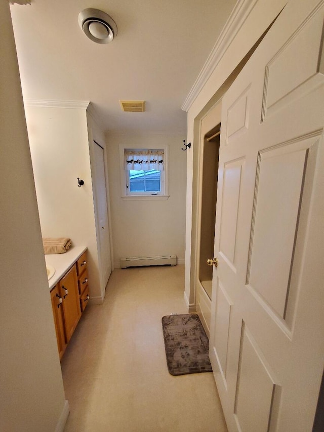 259-265 Bowden Point Rd, Prospect, ME 04981 - bathroom with baseboard heating, vanity, baseboards, shower / tub combo with curtain, and crown molding