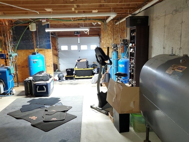 259-265 Bowden Point Rd, Prospect, ME 04981 - garage with heating fuel and a heating unit