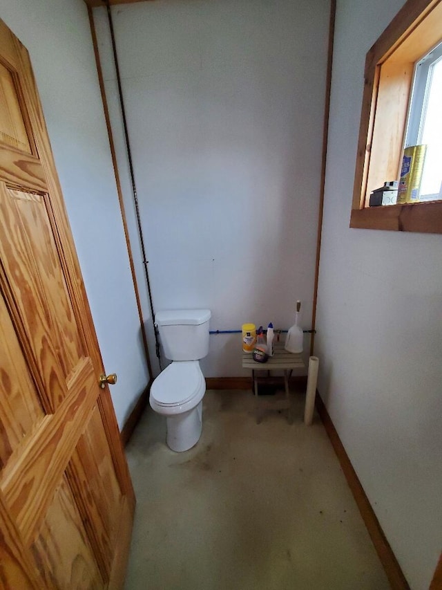 259-265 Bowden Point Rd, Prospect, ME 04981 - bathroom featuring toilet and baseboards