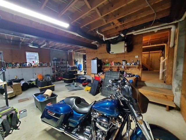 259-265 Bowden Point Rd, Prospect, ME 04981 - garage with a workshop area