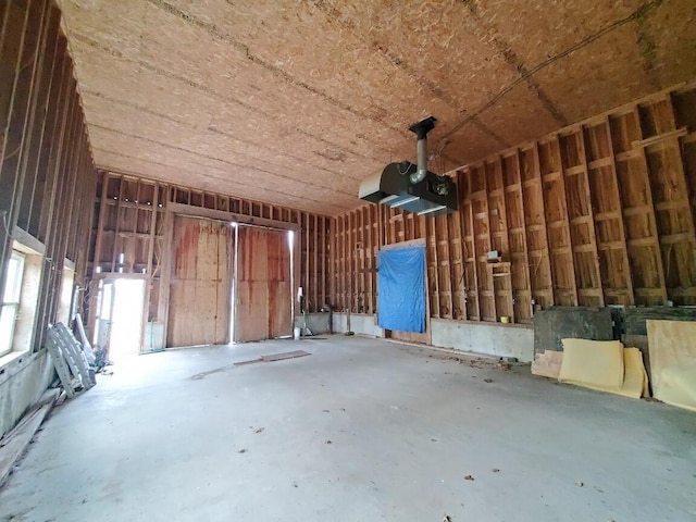 259-265 Bowden Point Rd, Prospect, ME 04981 - miscellaneous room featuring a garage and concrete floors