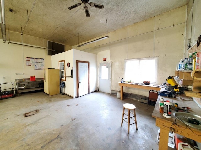 259-265 Bowden Point Rd, Prospect, ME 04981 - garage featuring a workshop area and ceiling fan