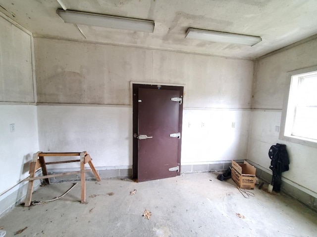 259-265 Bowden Point Rd, Prospect, ME 04981 - unfurnished room with unfinished concrete floors