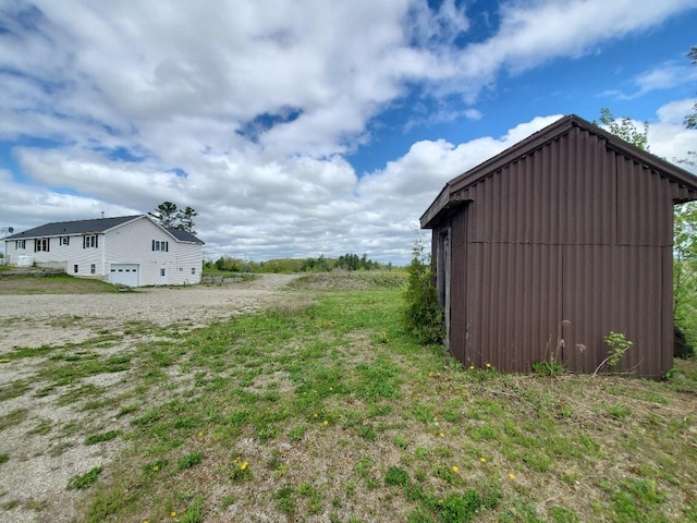 259-265 Bowden Point Rd, Prospect, ME 04981 - view of yard with an outdoor structure and a pole building