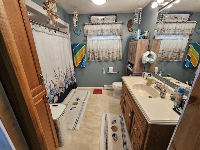 full bathroom with a baseboard heating unit, vanity, a shower with shower curtain, toilet, and a textured ceiling