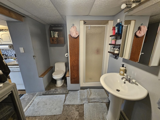 full bath featuring a stall shower and toilet