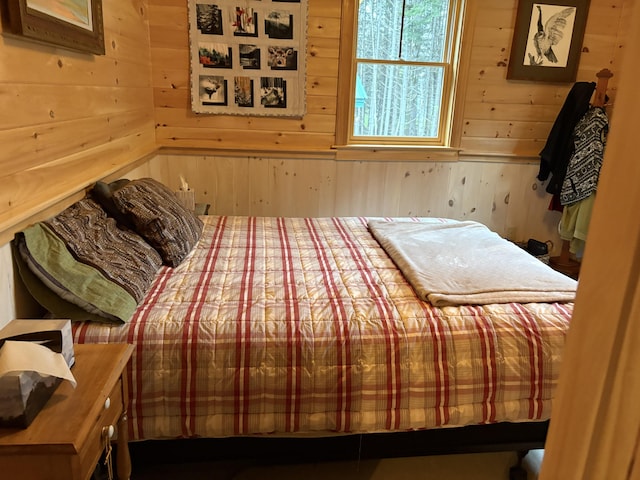 54 Orris Lamb Rd W, Dallas Plt, ME 04970 - bedroom featuring wood walls