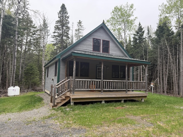 54 Orris Lamb Rd W, Dallas Plt, ME 04970 - view of front of home with covered porch and a front yard