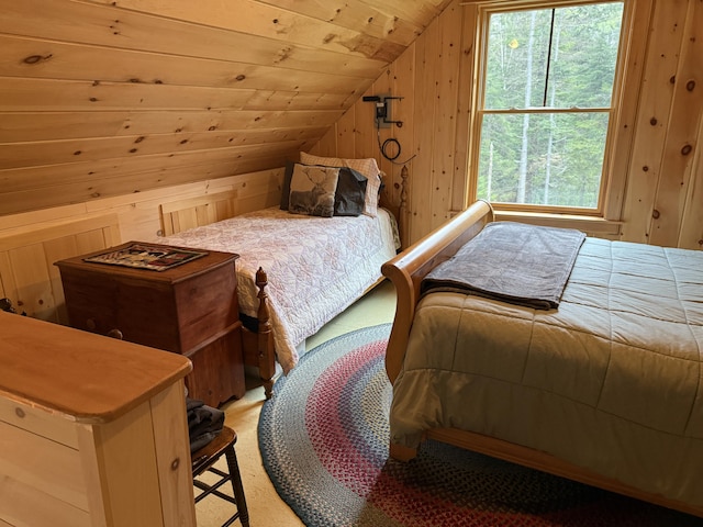 54 Orris Lamb Rd W, Dallas Plt, ME 04970 - bedroom featuring lofted ceiling, wood walls, light carpet, and wood ceiling