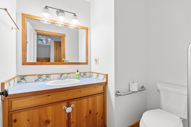 21 Harpswell Islands Rd, Harpswell, ME 04079 - half bathroom featuring toilet and vanity