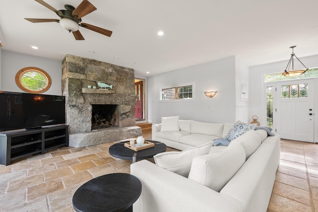 21 Harpswell Islands Rd, Harpswell, ME 04079 - living area with stone tile flooring, healthy amount of natural light, a fireplace, and recessed lighting