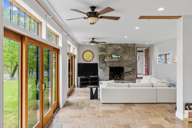 21 Harpswell Islands Rd, Harpswell, ME 04079 - living area with stone tile floors, a ceiling fan, recessed lighting, and a large fireplace