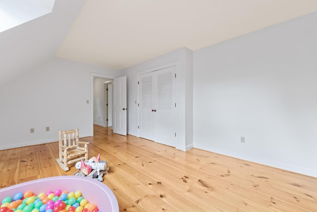 21 Harpswell Islands Rd, Harpswell, ME 04079 - game room featuring hardwood / wood-style floors, baseboards, and lofted ceiling