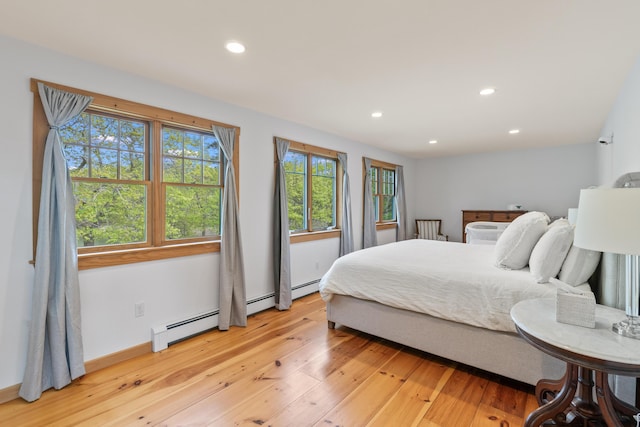 21 Harpswell Islands Rd, Harpswell, ME 04079 - bedroom with recessed lighting, light wood-style flooring, baseboard heating, and baseboards