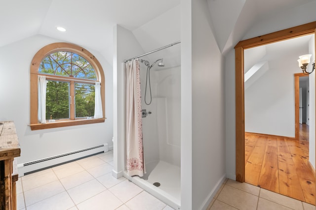 21 Harpswell Islands Rd, Harpswell, ME 04079 - full bathroom featuring baseboard heating, vaulted ceiling, curtained shower, tile patterned floors, and vanity