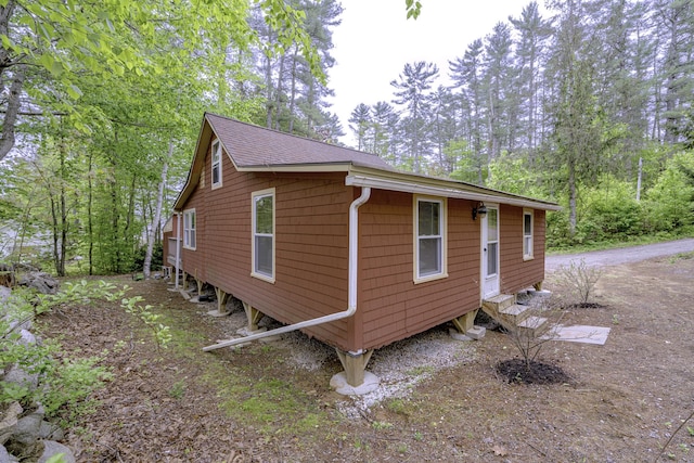 107 Meadow Rd, Raymond, ME 04071 - view of property exterior featuring a shingled roof