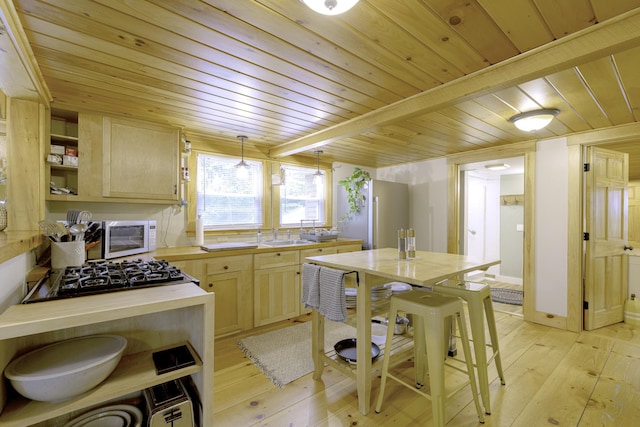 107 Meadow Rd, Raymond, ME 04071 - kitchen with wood ceiling, light wood-style flooring, butcher block countertops, light brown cabinetry, and open shelves