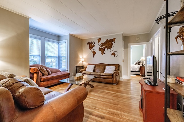 45 High St, Biddeford, ME 04005 - living area with crown molding and light wood finished floors